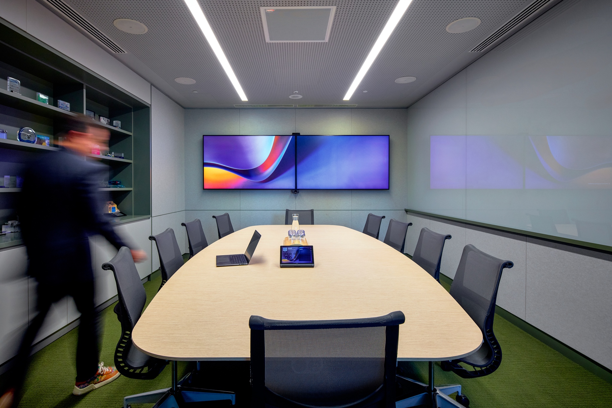 indoors, shoe, meeting room, office, desk, adult, male, man, person, chair